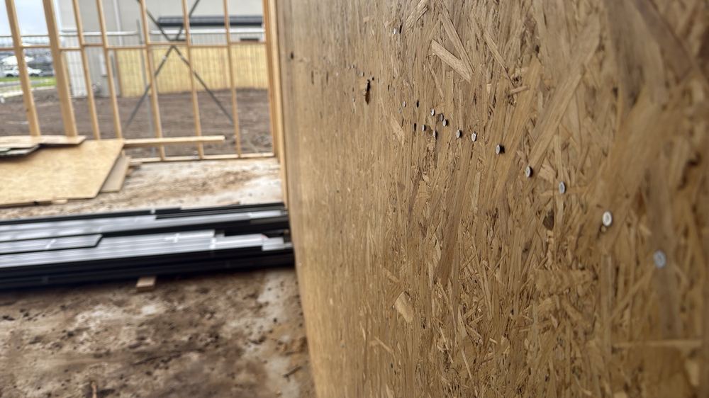 Nails left protruding from the frame, a hazard for every trade that follows, Mambourin