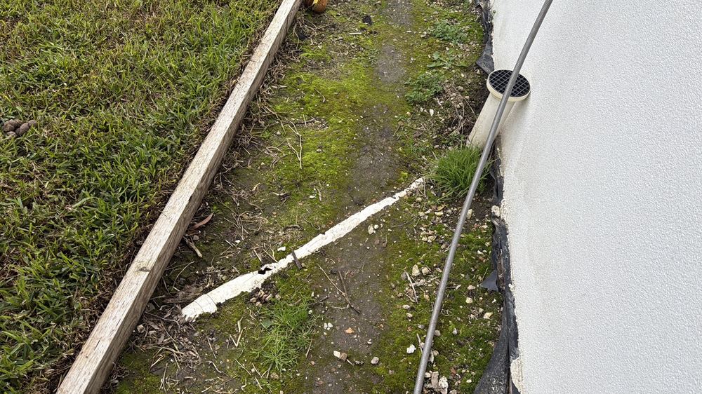 Stormwater pipes laid shallow at the rear of the dwelling, Herne Hill, Mambourin