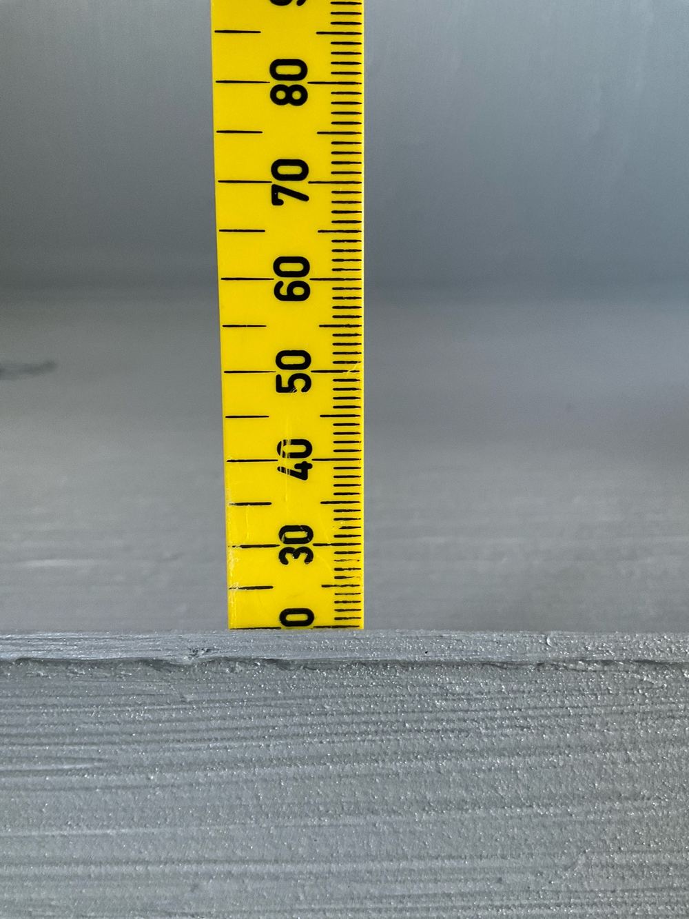 Hob height to confirm so finished tiles sit 15mm above it, found during a waterproofing inspection in Lara